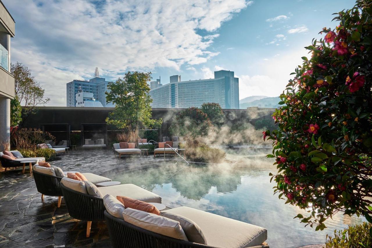 Lotte Hotel Busan Exterior foto The thermal pool at the Baur au Lac