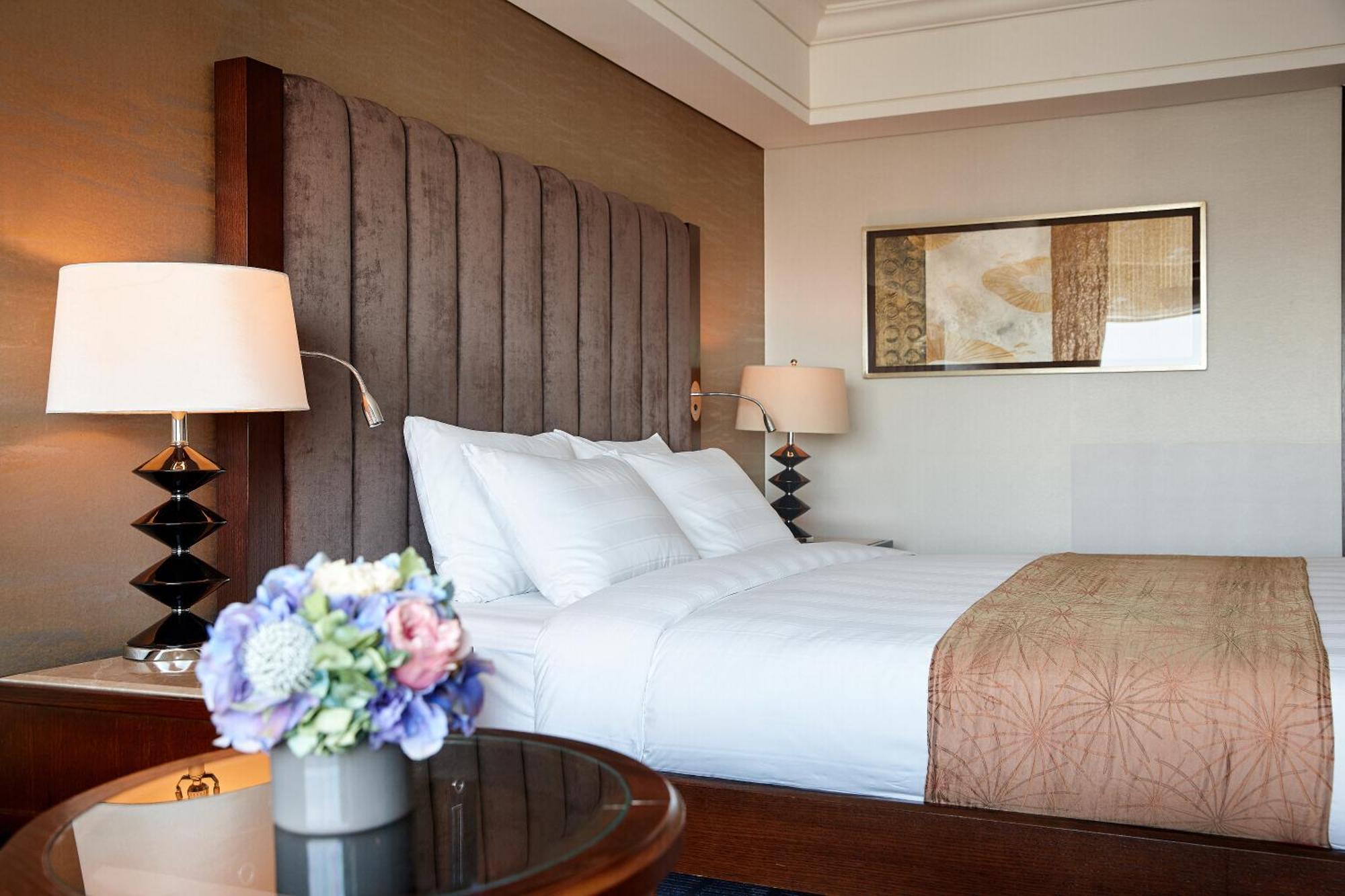 Lotte Hotel Busan Exterior foto A bedroom at the hotel