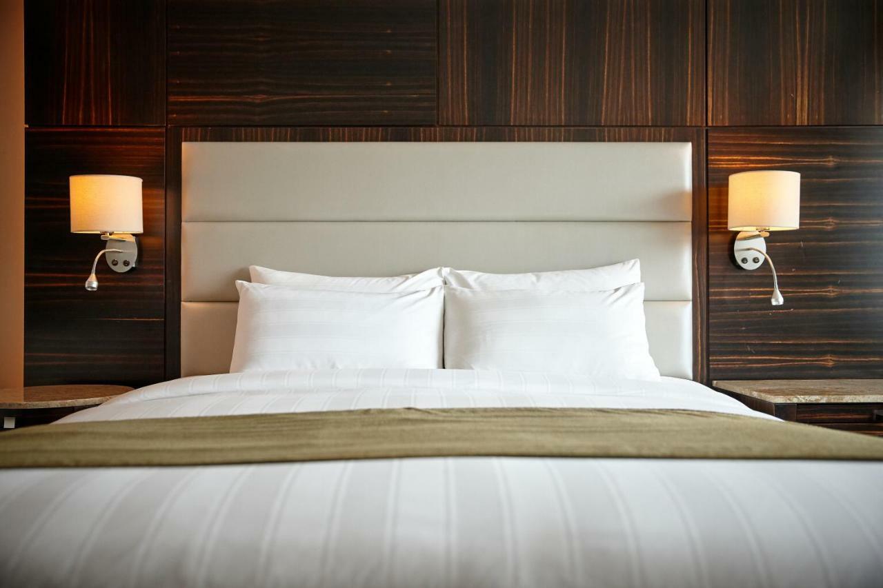 Lotte Hotel Busan Exterior foto A bed