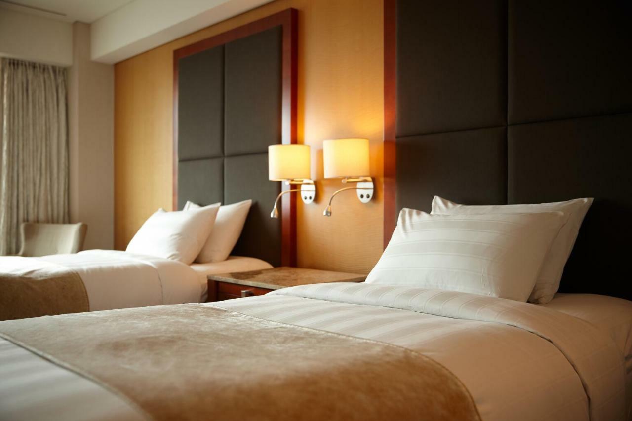 Lotte Hotel Busan Exterior foto A bedroom